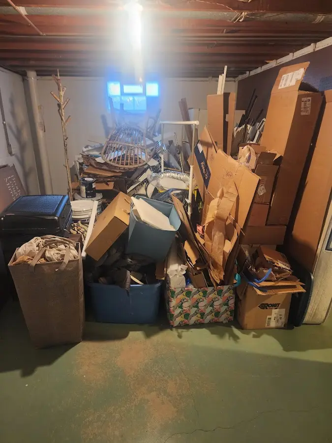 Roll-off dumpster container at job site for 8 Yard Dumpster Rental in Massapequa Park